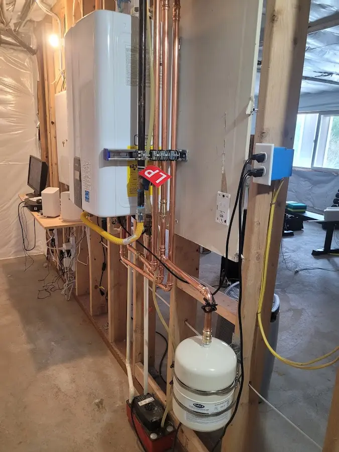 Licensed plumber repairing a kitchen sink in Midfield