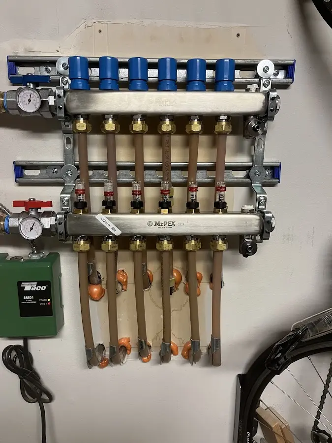 Plumber performing Gas Line Installation at a residential property in Midfield